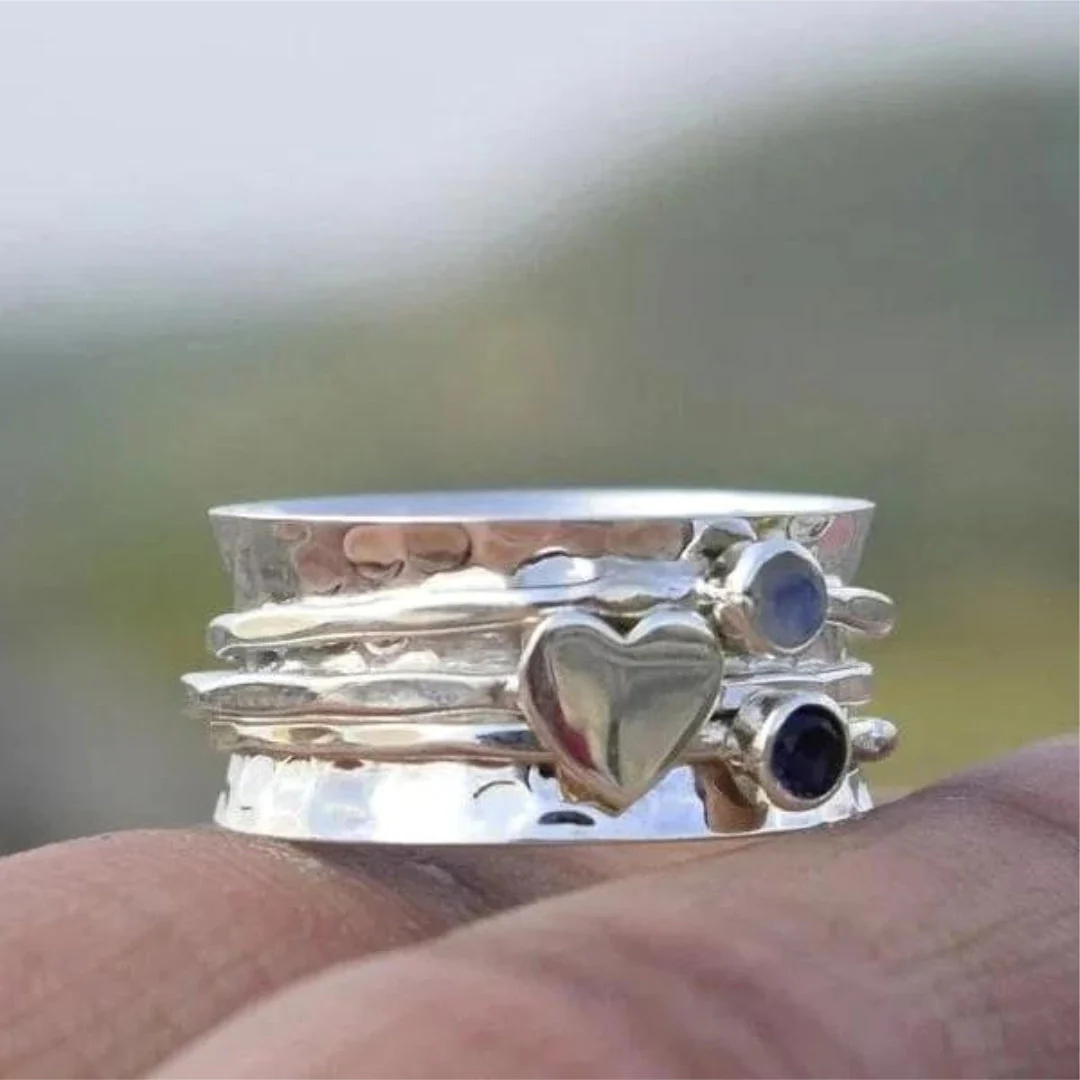 Elegant Silver-tone Rotating Heart Ring