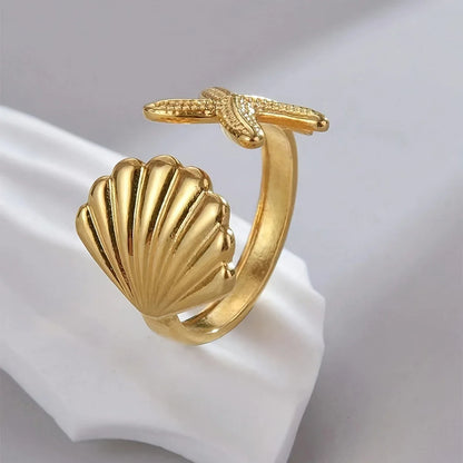 Elegant Gold-tone Starfish and Shell Ring