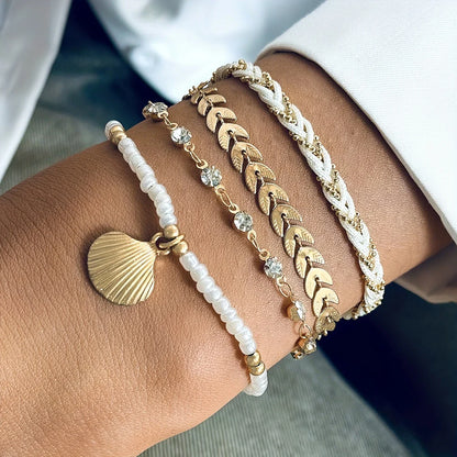 Set of 4 Elegant Gold-tone Shell Bracelets