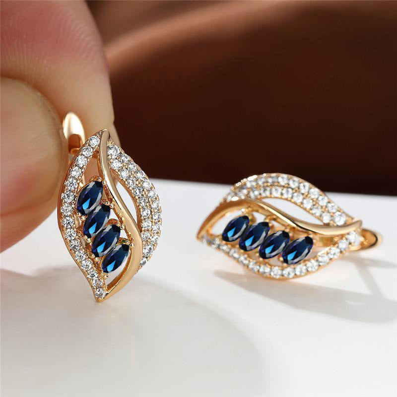 Isola Caelurelle Earrings | Gold-tone