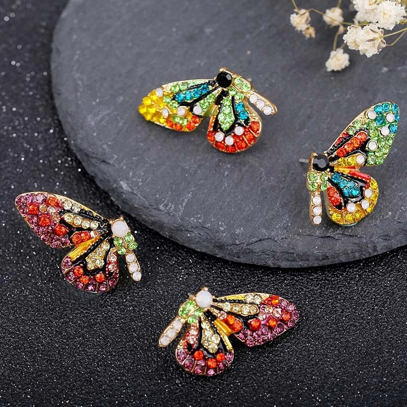 Limited edition butterfly earrings with double-set cubic zirconia