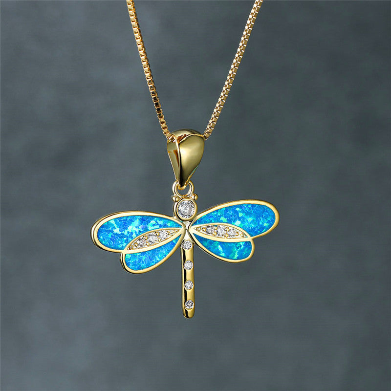 Gold-tone dragonfly necklace with Iridescent