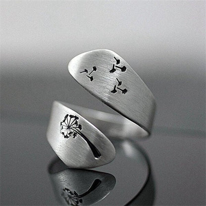 Hand-carved adjustable dandelion ring