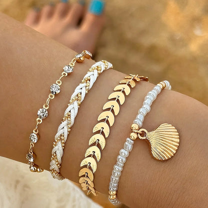 Set of 4 Elegant Gold-tone Shell Bracelets