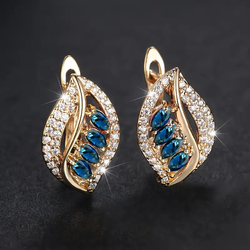 Isola Caelurelle Earrings | Gold-tone