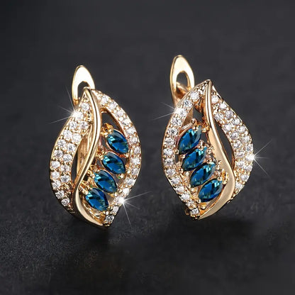 Isola Caelurelle Earrings | Gold-tone
