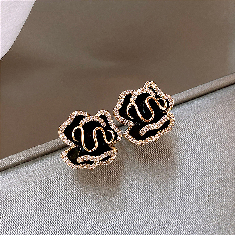 Elegant Gold-tone Black Lotus Earrings