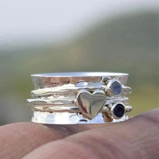 Elegant Silver-tone Rotating Heart Ring
