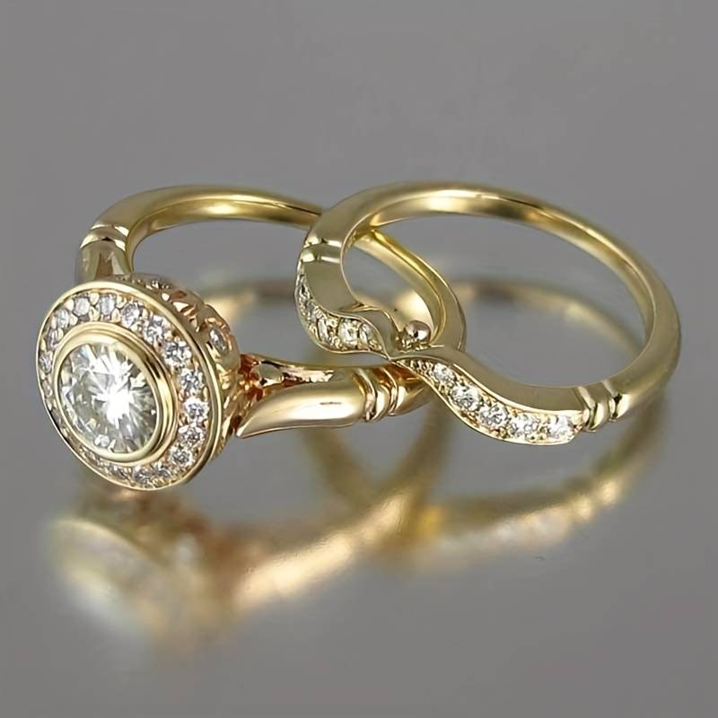 Pack of vintage golden and cubic zirconia rings