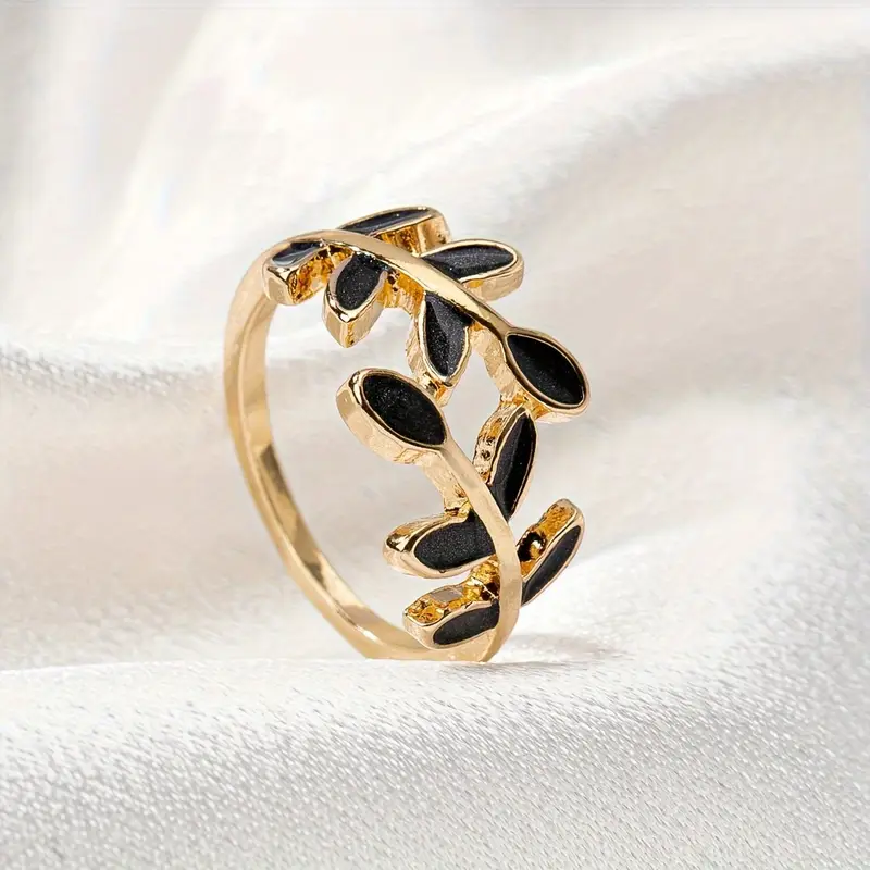 Gold-tone black leaf ring
